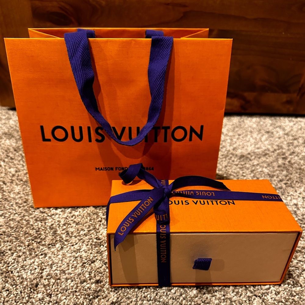 Louis Vuitton box and shopping bag